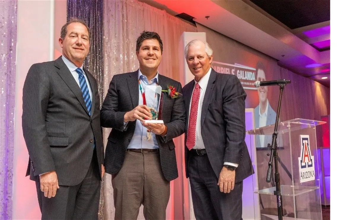 Gabe receiving award.