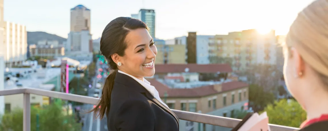 University of Arizona Law graduate on balcony