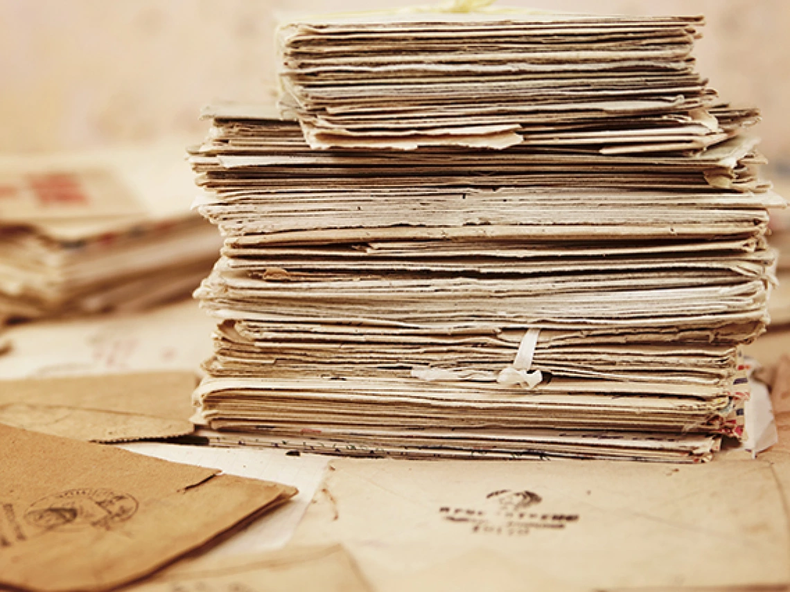 old documents stacked in a pile 