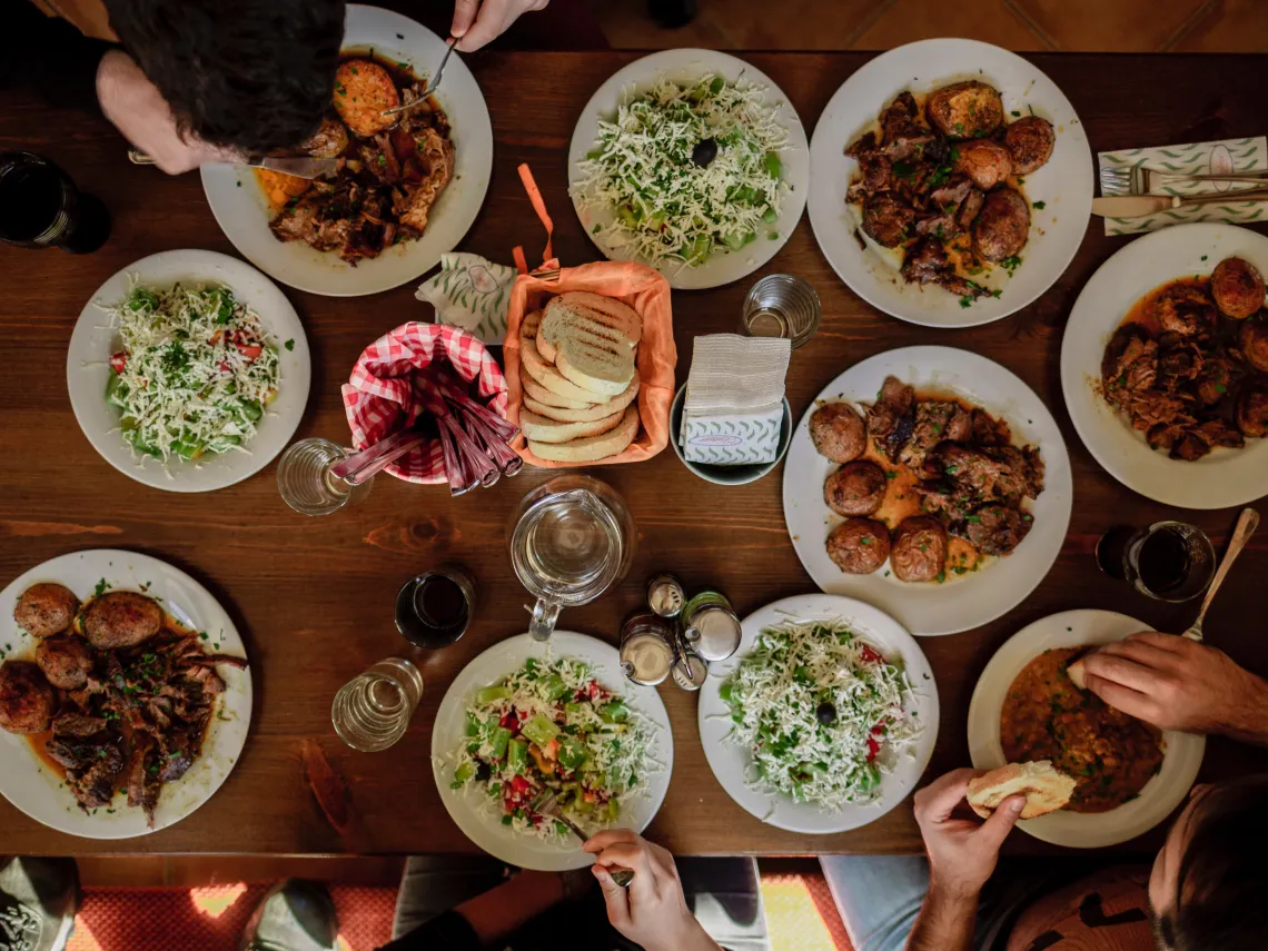 Group of people sharing meal 