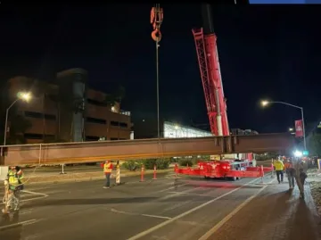 Beam arrives at UArizona Law, shutting down Speedway Blvd. 