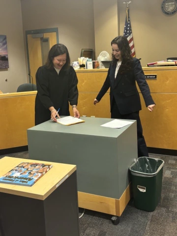 Pima County Superior Court Commissioner Helena Seymour with Sofia Urias (‘24) as her sponsoring attorney during her swearing in ceremony